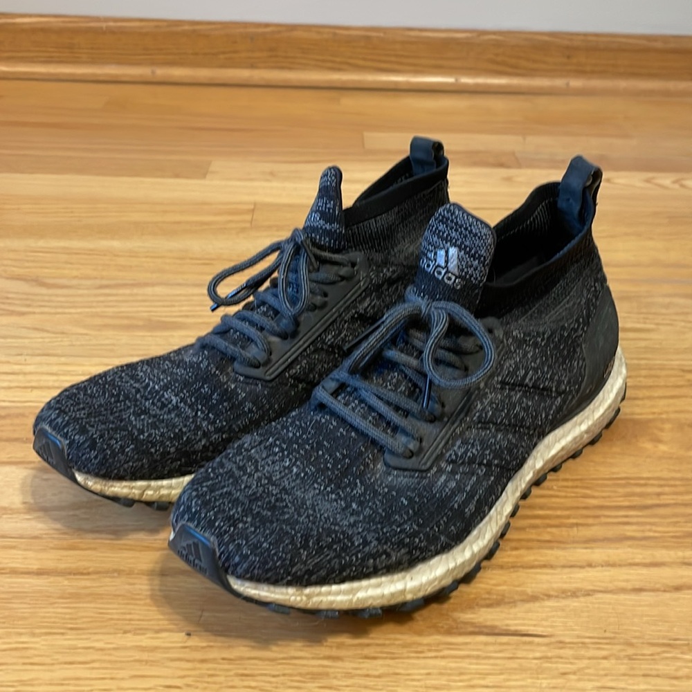Men’s black Adidas sneakers